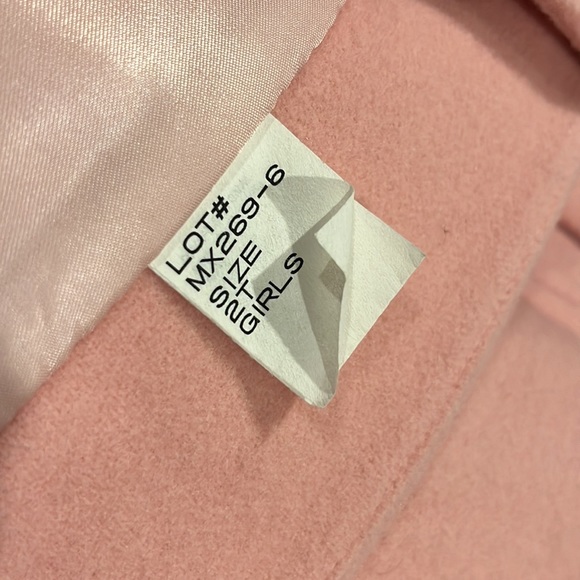 Pink Faux Fur coat. Elegant coat features a hand warmer plush accessory. - Picture 6 of 7